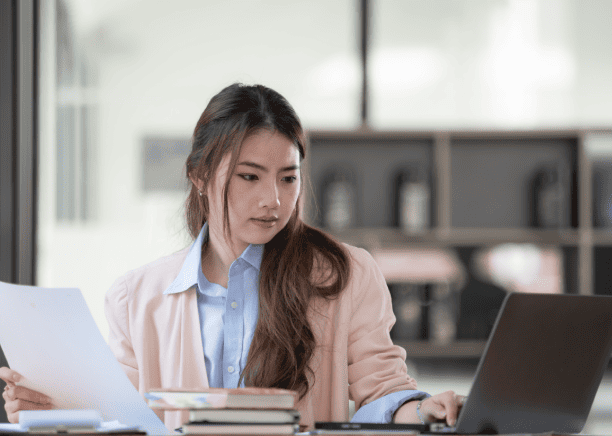 A certified translator working on accurate document translations to ensure flawless translations for Florida clients.